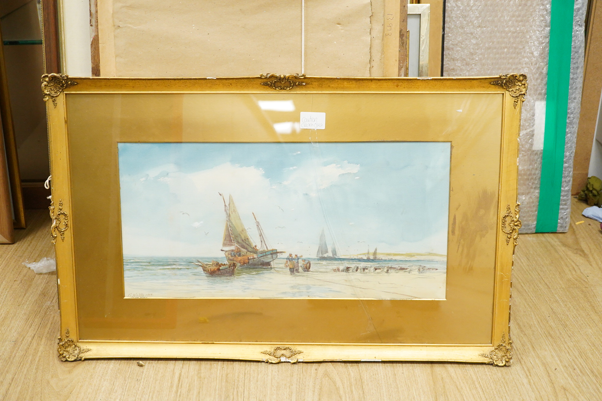 S. Watts, Fishing boats, one signed and dated 1912, pair of watercolours, gilt framed, 25 x 50cm